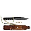 Randall made Bowie knife in a sheath with a brass crossguard, a wooden grip