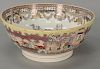 Large English soft paste bowl having Chinese courtyard painted interior scene, 19th century (hairline crack in base). 
ht. 5 in.; di...