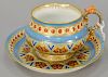 Russian porcelain cup and saucer with high relief decoration and rooster handle