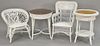Four piece wicker lot including two fancy chairs, a round table dia. 24", and an oval table top: 24" x 34".
