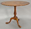 Irving and Cassone A.A. Davenport burlwood shaped tip table, ht. 29", top: 27" x 36".