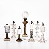 Seven Colorless and Brass Lamps