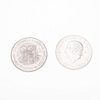Dos monedas, Hidalgo y Madero en plata .900. Peso: 57.6 g.