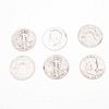 Seis monedas Liberty en plata . Peso: 73.9 g.