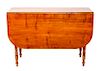 An American Pine Drop Leaf Table Height 29 x width 42 x length 16 1/2 inches (closed)