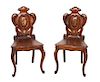 A Pair of Renaissance Revival Carved Oak Side Chairs Height 35 1/2 inches