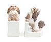 A Pair of Dahl Jensen Porcelain Figural Bookends Height 6 1/2 inches.