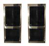 Two Brass and Glass Vitrines Height 74 1/4 x width 17 1/4 x depth 13 1/2 inches.