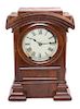 * A Victorian Mahogany Mantle Clock Height 15 1/4 inches.
