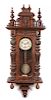 * A Victorian Walnut Regulator Clock, Junghans Height 48 inches.
