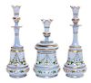 * An Enameled Glass Three-Piece Dresser Set Height of bottles 9 1/2 inches.
