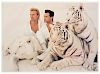 [Siegfried & Roy]. Siegfried & Roy and White Tigers.
