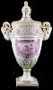 18th c. Continental  soft paste porcelain garniture urn with molded rams head handles, classical fri