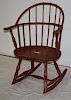 Windsor armed rocking chair. Later red wash.