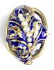 Victorian acanthus leaf brooch having blue enamel decorated and 7 freshwater pearl center.