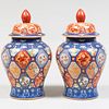 A Pair of Chinese Porcelain Baluster Jars and Covers