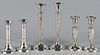 Three pairs of weighted sterling silver candlesticks, tallest - 9''.