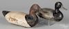 Two carved and painted duck decoys, mid. 20th c., to include an Illinois bluebill