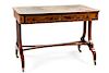 A Regency Rosewood and Calamander Writing Table Height 27 1/2 x width 40 x depth 23 1/2 inches.