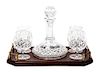A Waterford Cut Glass Brandy Decanter and Four Snifters Height of decanter 10 inches.