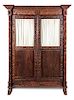 A Colonial Carved Hardwood Clothes Press Height 72 1/2 x width 54 x depth 26 inches.