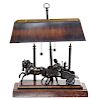 * A Neoclassical Cast Metal Figural Table Lamp Width 17 inches.