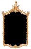 A Rococo Style Giltwood Mirror Width 26 1/2 inches.