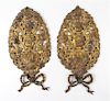 A Pair of Pressed Brass Wall Appliques Height 17 inches.