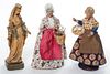 * Three Carved Wood Figures Height of tallest 10 1/2 inches.