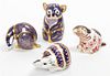 * A Collection of Royal Crown Derby Porcelain Figural Paperweights Height of tallest 4 1/2 inches.