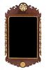 * A Chippendale Style Mahogany and Parcel Gilt Mirror. Height 45 x width 26 1/2 inches.
