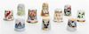 A Group of Porcelain Thimbles Height of first 1 inch.