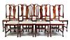 * A Set of Twelve Carved Mahogany Side Chairs Height 41 inches.
