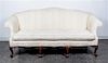 * A Georgian Style Mahogany Camelback Sofa Height 39 x width 75 x depth 29 inches.