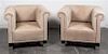 A Pair of Suede Upholstered Club Chairs Height 30 x width 37 x depth 29 1/2 inches.