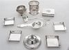 * A Collection of Silver-plate Table Articles, , comprising four square nut dishes, a lidded box, a tea strainer, a ladle and ot