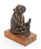 A Japanese Bronze Figure of a Monkey Height overall 5 1/2 inches.
