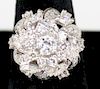 14k w.g. ladies diamond ring, center ¼ rd cut diamond surrounded by extravagant floral form setting