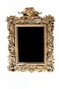 An Italian Rococo Carved Giltwood Mirror, Height 50 x width 40 inches.