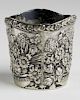 Floral repousse coin silver toothpick holder, molded in three parts. Bearing Egyptian hallmarks: 800
