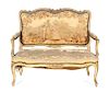 A Louis XV Giltwood Canape, Height 37 x width 43 1/2 x depth 22 inches.