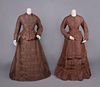TWO BROWN SILK DAY DRESSES, LATE 1870s