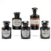 Group of Five Black Hyalite Apothecary Bottles 