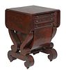 American Classical Carved Mahogany Drop Leaf Worktable, 19th c., the top over a bank of two drawers, and a lower work drawer, flanked by rounded corne