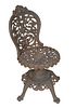 American Cast Iron Swivel Chair, 19th c., the curved canted foliate back over a pierced scrolled seat, on four splayed legs with paw feet, H.- 32 in.,