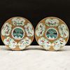 Pair of Chinese Export Famille Rose and Gilt-Ground Porcelain 'Peacock' Plates