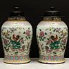 Pair of Chinese Famille Rose Porcelain Jars and Two Carved Wood Covers