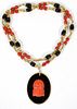 GOLD, CORAL & ONYX NECKLACE W/ CORAL BUDDHA PENDANT