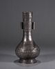 A taotie patterned silver double-eared vase