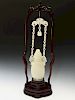A BEAUTIFUL ANTIQUE WHITE JADE HANGING VASE. 19TH CT